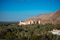 Sunset view of the Nakhal Fort surrounded by a palm grove, Oman Royalty Free Stock Photo