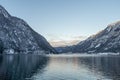 Sunset view of Obertaun village by Hallstatt lake with snowy mountain during winter time in Austria Royalty Free Stock Photo