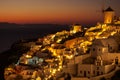 Sunset view of Oia town on Santorini in Greece Royalty Free Stock Photo