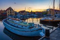 Sunset view of old boats at marina in Svendborg, Denmark Royalty Free Stock Photo