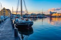 Sunset view of old boats at marina in Svendborg, Denmark Royalty Free Stock Photo