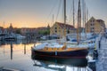 Sunset view of old boats at marina in Svendborg, Denmark Royalty Free Stock Photo