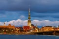 sunset view of Old Riga across the Daugava river Royalty Free Stock Photo