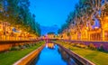 Sunset view over La Bassa river flowing through the city center of Perpignan, France Royalty Free Stock Photo