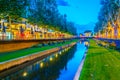 Sunset view over La Bassa river flowing through the city center of Perpignan, France Royalty Free Stock Photo