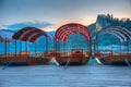 Sunset view over rowing boats looking at Bled castle in Slovenia Royalty Free Stock Photo