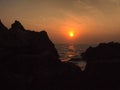 Sunset view over sea with stones Royalty Free Stock Photo