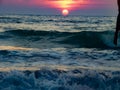 Sunset view over sea waves Royalty Free Stock Photo