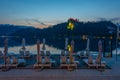 Sunset view over a swimming pool looking at Bled castle in Slove Royalty Free Stock Photo