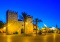 Sunset view of Porta del moll leading to the old town of Alcudia, Mallorca, Spain Royalty Free Stock Photo