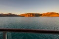 Sunset view of Prince Frederick Harbor in the remote Kimberley coast of Western Australia from a balcony stateroom of an anchored