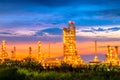 Sunset view of refinery petroleum and petrochemical plant industrial with distillation column and engineering equipment and pipe Royalty Free Stock Photo