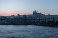 Sunset view of River Vltava, Charles Bridge and Prague Castle in Czech Republic Royalty Free Stock Photo