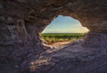 Sunset view through the rock. Arenite hole, in Jalapao, Brazil. Pedra furada.