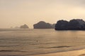 Sunset view on rock islands and sea in Ha Long Bay. Cat Ba, Vietnam Royalty Free Stock Photo