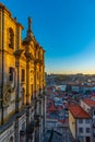 Sunset view of saint Lawrence church and Palacio da Bolsa at Porto, Portugal Royalty Free Stock Photo