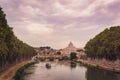 Sunset view of Saint Peter`s Basilica and Sant`Angelo`s Bridge and Tiber river Royalty Free Stock Photo