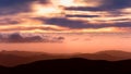 Sunset view of sea of clouds covering the hills and valleys of Santa Cruz mountains; San Francisco bay area, California Royalty Free Stock Photo