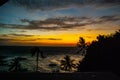 Sunset, view of the sea and palm trees. Apo island, Philippines Royalty Free Stock Photo