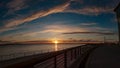 Sunset view from the seaport pedestrian walkway Royalty Free Stock Photo