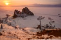 Sunset view of Shaman rock one of sacred place in frozen lake Baikal in winter season of Siberia, Russia. Royalty Free Stock Photo