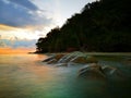 Sunset view with silky smooth water reflection on the sea shore landscape with beautiful sunset view. Royalty Free Stock Photo