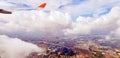 Sunset view of sky and clouds from window of aircraft flight Royalty Free Stock Photo