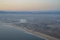 Sunset view of sky from a window seat in an airplane Royalty Free Stock Photo