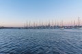 Sunset view of skyline of Melbourne behind marina at St. Kilda, Australia