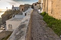 Sunset view of street in Fira, Santorini island, Thira, Greece Royalty Free Stock Photo