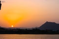 Sunset view from the terrace of the lake palace hotel in Udaipur