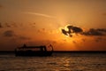 Sunset with a view to the ocean with boats