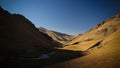 Sunset view to Tash-Rabat river and valley in Naryn province, Kyrgyzstan