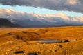 Sunset view of tourists cars at lake on Plateau Ukok Royalty Free Stock Photo