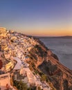 Sunset view of traditional Greek village Oia on Santorini island in Greece Royalty Free Stock Photo