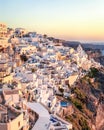 Sunset view of traditional Greek village Oia on Santorini island in Greece Royalty Free Stock Photo