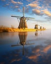 Sunset view at typical windmill at Kinderdijk, Holland. Royalty Free Stock Photo