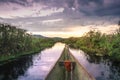 Sunset view whilst looking for Shoebill storks Balaeniceps rex bird in Mabamba Swamp from a little wooden fishing boat