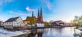 Sunset view of white building of Uppland museum and cathedral in Uppsala, Sweden Royalty Free Stock Photo