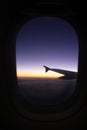Sunset view from the window of an aeroplane Royalty Free Stock Photo