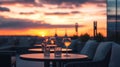 Sunset View with Wine Glass and Empty Seats at a Rooftop Bar Royalty Free Stock Photo