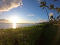 Sunset over calm ocean Hawaii shore Royalty Free Stock Photo