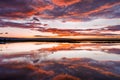 Sunset views of the tidal marshes of Alviso with colorful clouds reflected on the calm water surface, Don Edwards San Francisco Royalty Free Stock Photo