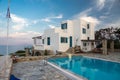 Sunset vila and pool view during hot summer day on Antiparos island in Cyclades in Greece