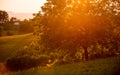 Sunset in the village, farms in the summer