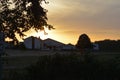 sunset in village in Germany with empty railways on sunset sky background