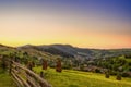 Sunset in a village between mountains, peaceful view