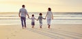 Sunset, walking on beach and family holding hands on holiday, summer vacation and weekend. Nature, travel and mother Royalty Free Stock Photo