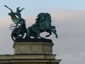 Warrior`s statue in a pedestal on sunset to Budapest in Hungary.