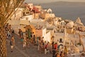 Sunset watchers on Santorini Island. Royalty Free Stock Photo